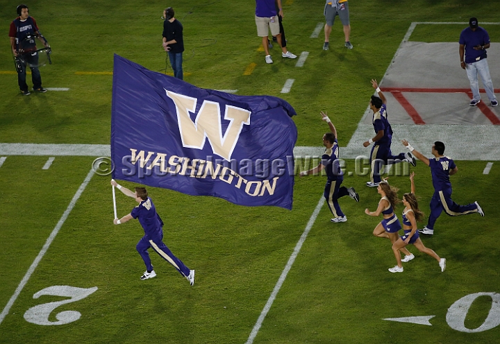 2013Stanford-Wash-048.JPG - Oct. 5, 2013; Stanford, CA, USA; Washington Huskies cheer leaders take the field for game against the Stanford Cardinal at  Stanford Stadium. Stanford defeated Washington 31-28.